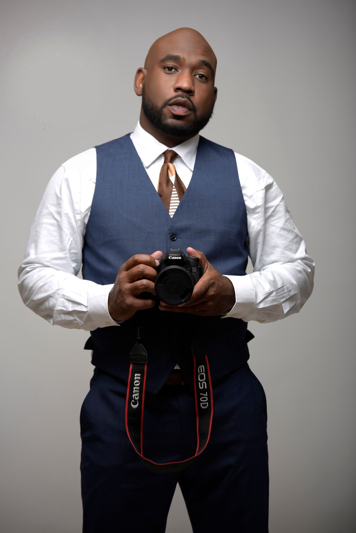 Jeffrey Faulkner holding his camera